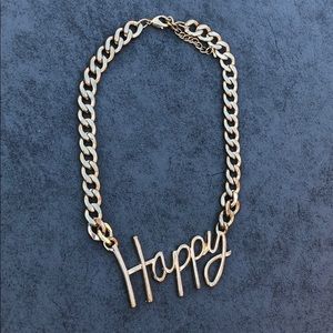 Gold tone chain “Happy” necklace